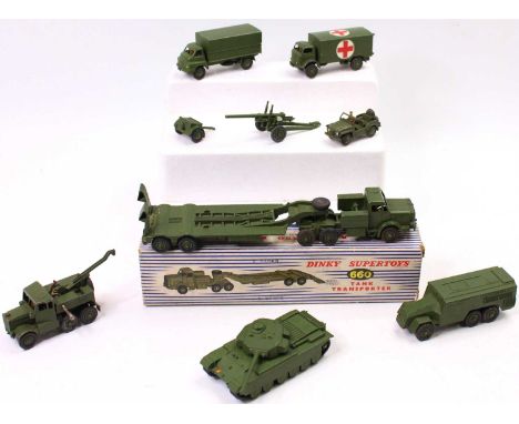 A collection of Dinky Toys military vehicles including a boxed No. 660 Tank Transporter, No. 651 Centurion Tank, No. 621 3 To