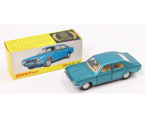 French Dinky Toys, 1409, Chrysler 180, metallic turquoise body, light tan interior, detailed hubs, in the original all card b