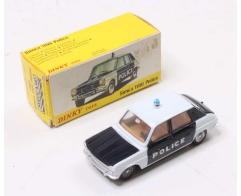  Dinky Toys Spanish issue No. 1450 Simca 1100 police car comprising of black &amp; white body with spun hubs and brown interi