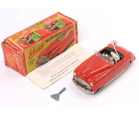 Schuco (Germany) No.4002 Tacho-Examico tinplate clockwork Car, red body with dark green seats, steerable front wheels, with M