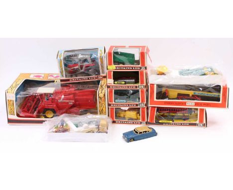 A collection of boxed Britains farming models and implements to include, No. 9570 Massey Ferguson Combine Harvester, No. 9522