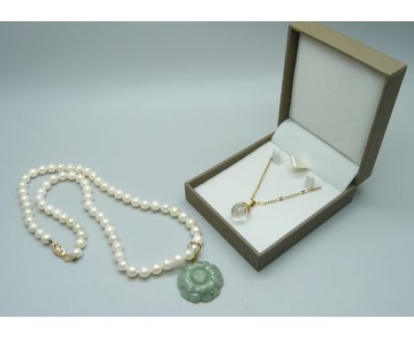 A 9ct gold and crystal pendant and chain, (chain 2.1g) and a pearl necklace with jade pendant and 14ct gold clasp and hanger