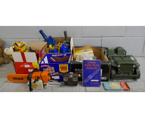 A collection of toys, including Ghostbusters, Action Man jeep, toy Stihl chainsaw and sander, Bakelite viewer and slides, sli