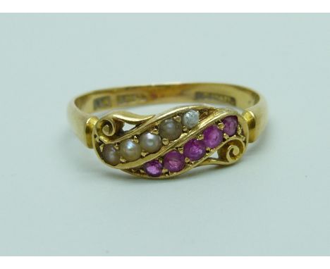 An 18ct gold ruby and pearl ring, with inscription dated 1900, 3.2g, Q, in a vintage box