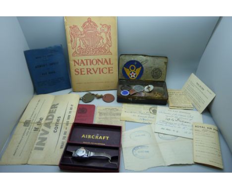 A WWI wound badge, 207917, lacking pin, an 'If the Invader comes' leaflet, a RAF Service and Pay Book, a wristwatch in a box 