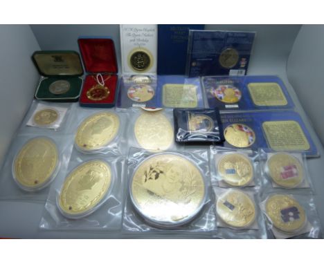 A collection of commemorative and special issue coins, including four Kings oval gold plated coins set with Swarovski crystal