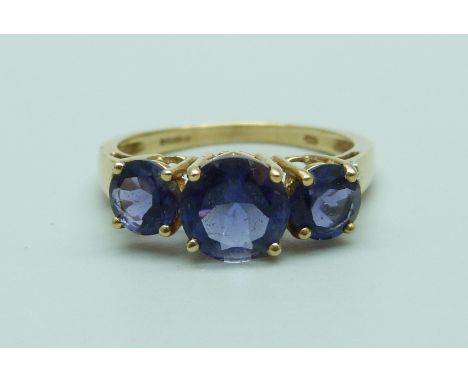 A 9ct gold tanzanite and iolite ring, 2.4g, N