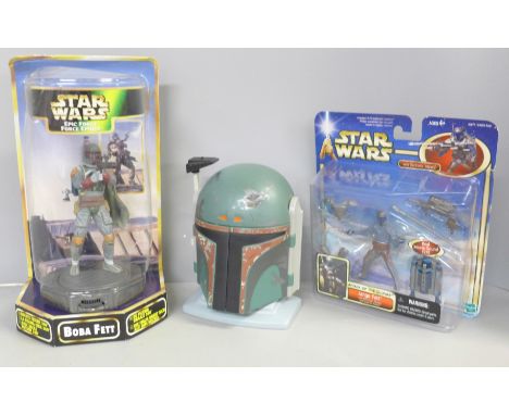 Star Wars, Boba Fett and Jango Fett figures, boxed and a Boba Fett model helmet