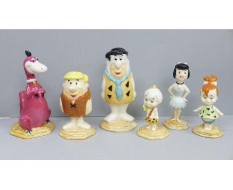 Six Beswick Fred Flintstone figures, five boxed