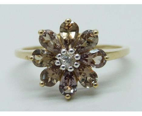 A 9ct gold, colour change garnet and white sapphire cluster ring, with certificate, 2.7g, S