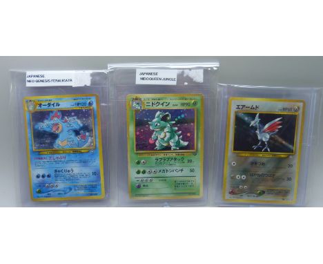 Three vintage Japanese holographic cards - Neo Genesis Feraligatr, Neo Genesis Skarmory and Nidoqueen Jungle