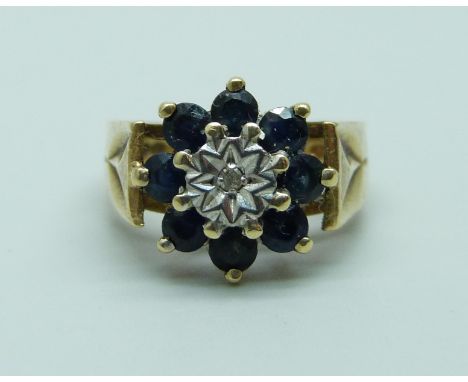 A 1970's 9ct gold, sapphire and diamond cluster ring, 4g, J