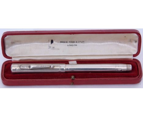 George VI silver cased fountain pen, Mabie Todd &amp; Co Ltd - London, the cylindrical case with screw on cover with engine t