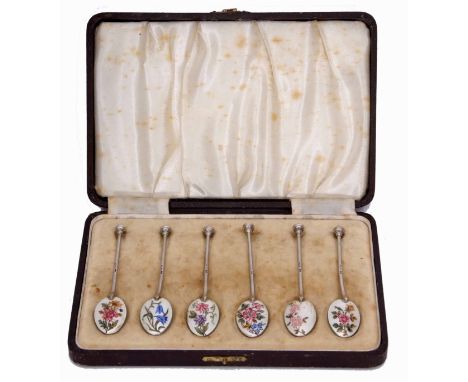 Cased set of six George VI silver and enamelled coffee spoons, each with wire work handles and seal tops and with floral enam