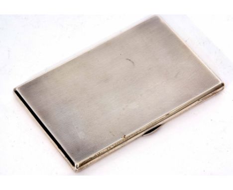 George V cigarette case of hinged rectangular form with all over engine turned decoration and gilt lined interior with presen