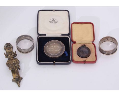 Mixed Lot: comprising two various cylindrical napkin rings together with a silver presentation medallion "HFS PC Phillipson, 