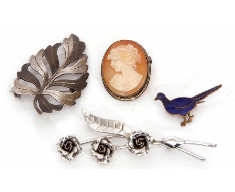 Mixed Lot: hallmarked silver pierced leaf brooch, Birmingham 1990, a white metal floral brooch stamped Silver, a vintage gilt