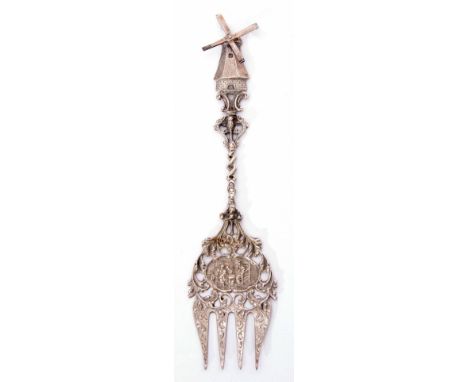 Continental serving fork with cast pierced and engraved tines and handle and with windmill finial with rotating sails, length