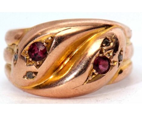 Early 20th century 9ct gold garnet and diamond serpent ring, design as two serpent heads, each with a garnet head and two sma