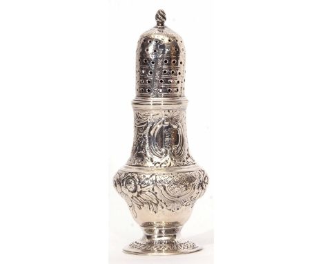 George III caster of baluster form with pierced pull off cover with cast and applied finial and all over embossed floral foli