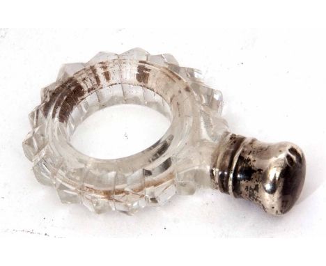 Late 19th century silver lidded and clear cut glass ring formed scent bottle, the faceted cut body to a polished and domed sc