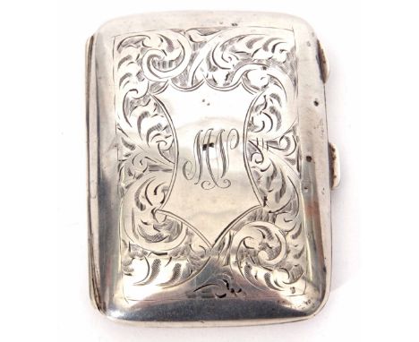 George V small cigarette case of hinged rectangular form with foliate engraved and initialled cover to a gilt lined interior,