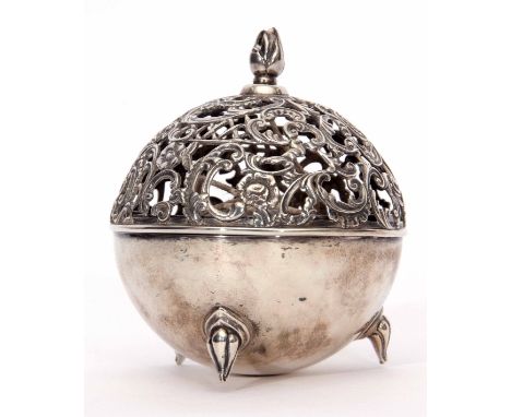 Victorian string box of spherical form, the cast C-scroll and pierced and hinged cover with cast and applied finial with hole