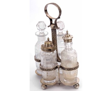 Late Victorian electro-plated four bottle cruet stand, the quatrefoil base raised on four ball feet to a strap work frame con