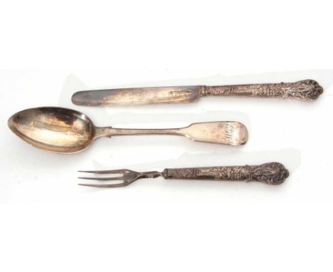 Cased composite three piece christening set, comprising spoon and fork with hollow cast and applied fruiting vine handles and