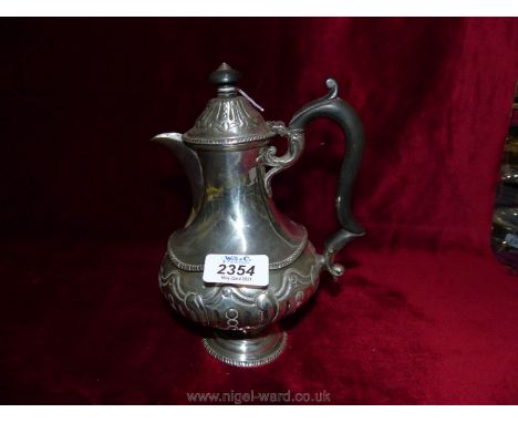 A Birmingham silver Coffee Pot, dated 1903, makers Levi and Salaman, slightly tilting from the base,, hinged lid with Bakelit