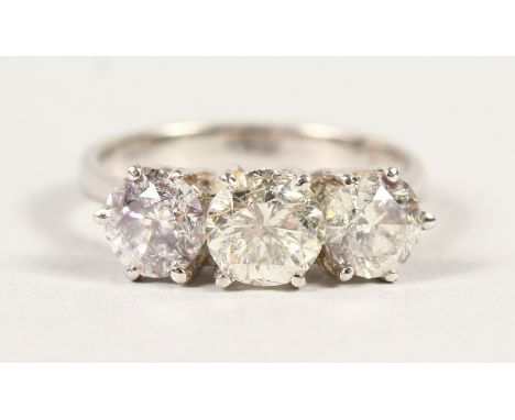 AN 18CT THREE STONE DIAMOND RING of 2.3cts.