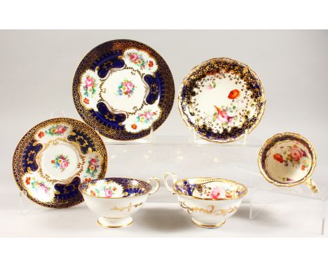 TWO HAMMERSLEY PORCELAIN TRIOS, blue and gilt decorated with roses.