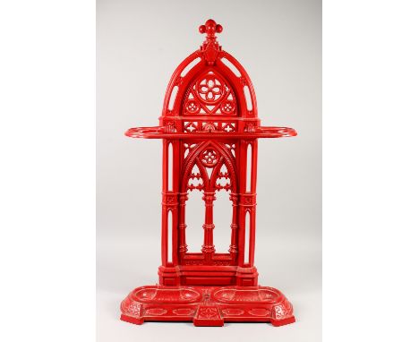 A VICTORIAN RED PAINTED IRON STICK STAND.