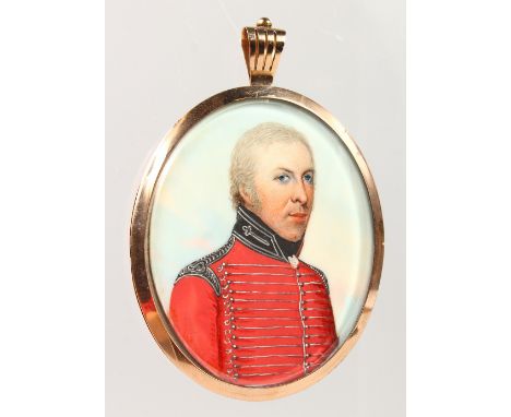 EARLY 19TH CENTURY ENGLISH SCHOOL, PORTRAIT OF AN ARMY OFFICER, wearing a red tunic. 2.5ins x 2ins.