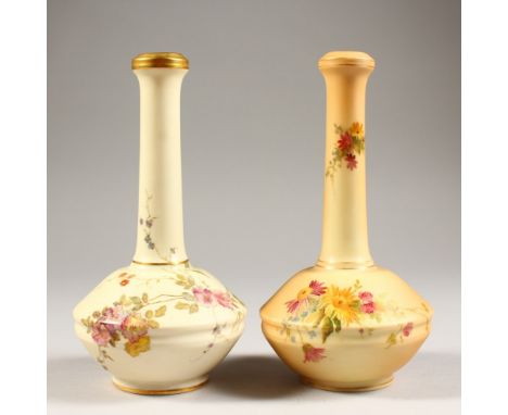 TWO ROYAL WORCESTER BLUSH IVORY BUD VASES, No. 1531 each painted with flowers. 7ins high.