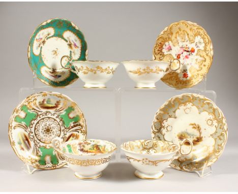 FOUR VARIOUS CUPS AND SAUCERS.
