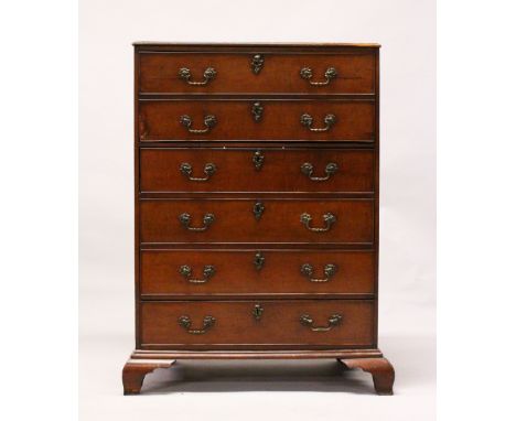 A GEORGE III MAHOGANY SECRETAIRE CHEST, the secretaire drawer fitted with small drawers, over four graduated long drawers, al