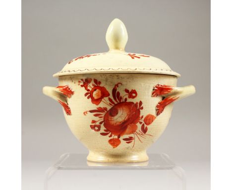 A 19TH CENTURY CREAMWARE SUCRIER, decorated with flowers.