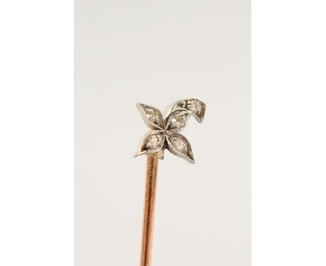 A GOLD AND DIAMOND STICK PIN.