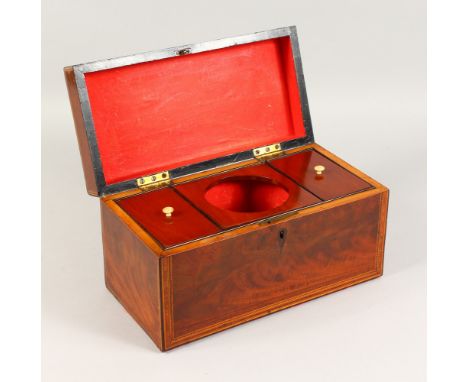 A GEORGE III MAHOGANY AND INLAID TEA CADDY, the interior with two lidded compartments and mixing bowl aperture (bowl lacking)