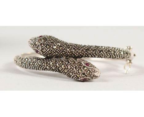 A SILVER AND MARCASITE SNAKE BANGLE.