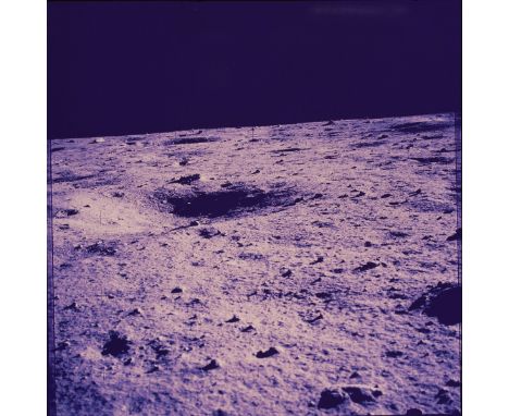 Original 70mm NASA color positive transparency film display depicting the lunar surface. Dated July 16, 1969 to July 21, 1969