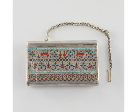 A Russian silver champleve enamel and silver cigarette case style. Enameled in shades of red, sky blue, and Persian blue alon