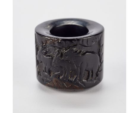 Chinese carved wooden archery ring carved in low relief with three rams.Height: 1 1/4 in x diameter: 1 1/2 in. Size: US 9.Con