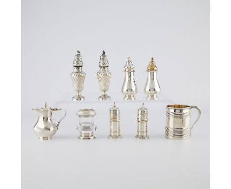 Group of nine sterling silver serving ware including:Two French salt and pepper shakers, each marked with a Minerva.Two Gorha