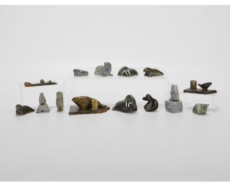 Group of 14 small Native American Inuit carved soapstone, stone, and jade animals. Some signed along the underside from artis