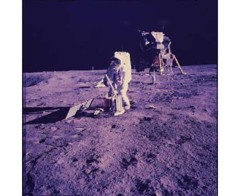 Original 70mm NASA color positive transparency film display depicting Buzz Aldrin on the surface of the moon with the lunar m
