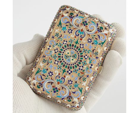 Russian gilt silver and enameled cigarette case. Marked with an 84 Kokoshnik and a maker's mark along two sides. Engraved alo