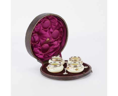 Elkington &amp; Co., Birmingham, England. Salt set consisting of four small glass salt cellars with gilt flowers and sterling