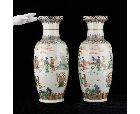 Pair of large 20th century Chinese famille verte porcelain vases. Each depicting figures playing instruments and dancing in a